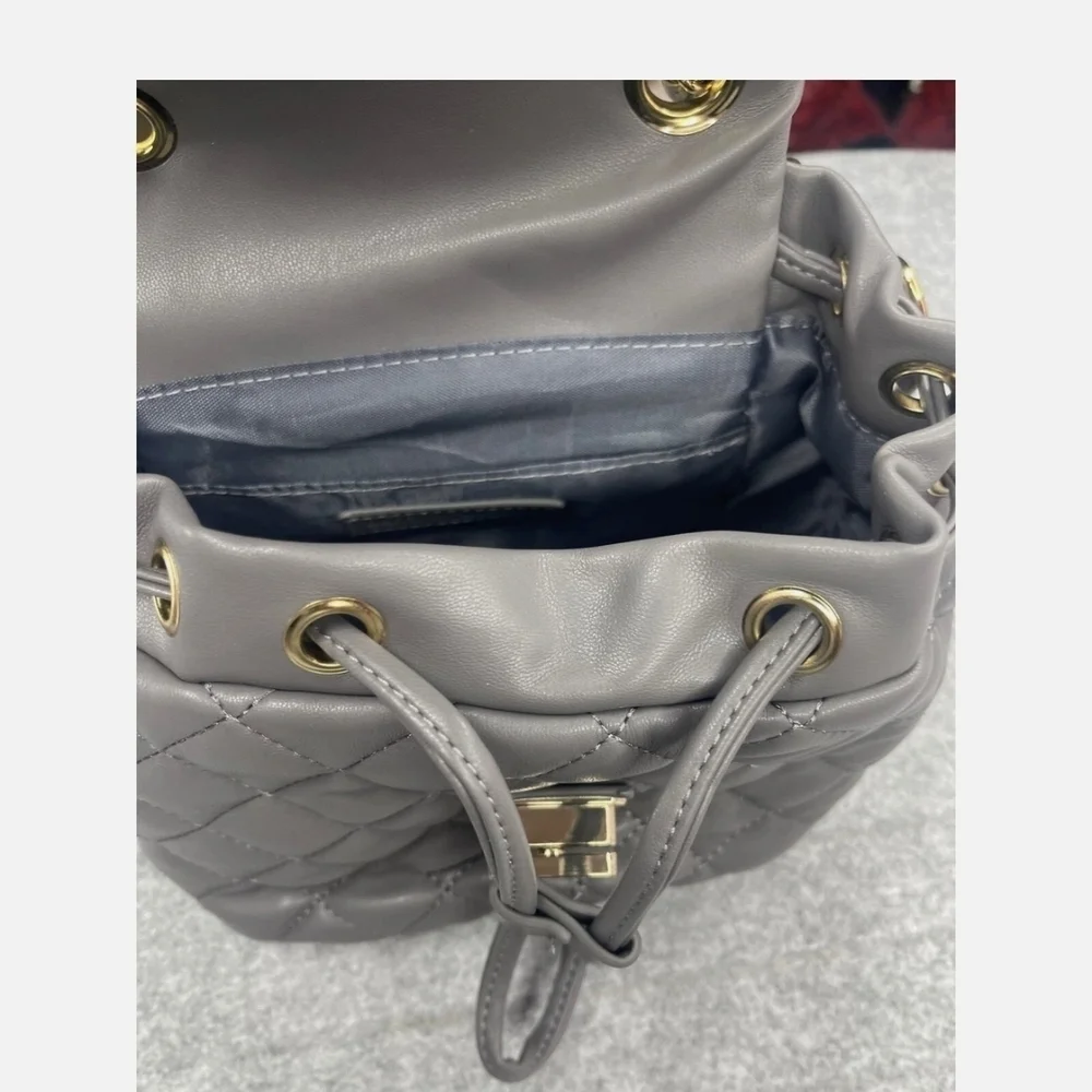 Badgely Mischka quilted mini  backpack, gray with gold tone hardware NWT